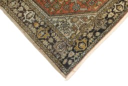 Backside of handmade 1920s Malayer rug showing knot structure and weave density