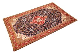Corner detail of 1950s Malayer rug showing border pattern and Wool pile