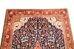 Surface texture of 1950s Malayer rug with natural Wool and intricate pattern