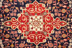 Central medallion detail of 1950s Malayer rug from Iran / Persia