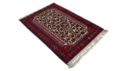 Close-up detail of 1970s Malayer rug from Iran / Persia showing Wool weave