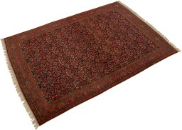 Close-up detail of 1900s Malayer rug from Iran / Persia showing Wool weave