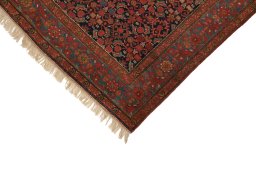 Backside of handmade 1900s Malayer rug showing knot structure and weave density