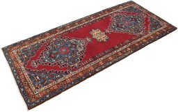 Close-up detail of 1980s Malayer rug from Iran / Persia showing Wool weave