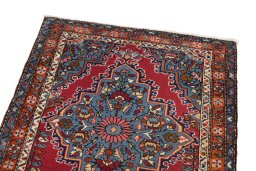 Surface texture of 1980s Malayer rug with natural Wool and intricate pattern