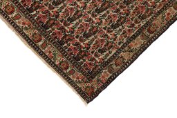 Backside of handmade 1900s Malayer rug showing knot structure and weave density