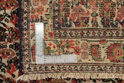 Close-up detail of 1900s Malayer rug from Iran / Persia showing Wool weave