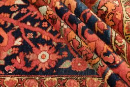 Corner detail of 1900s Malayer rug showing border pattern and Wool pile
