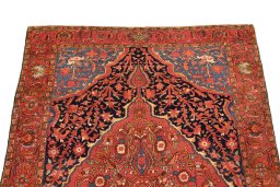 Surface texture of 1900s Malayer rug with natural Wool and intricate pattern