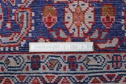 Corner detail of 2000s Malayer rug showing border pattern and Wool pile