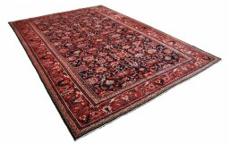 Corner detail of 2000s Malayer rug showing border pattern and Wool pile