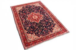 Corner detail of 2000s Malayer rug showing border pattern and Wool pile