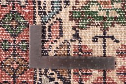 Corner detail of 1974s Malayer rug showing border pattern and Wool pile