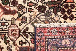 Close-up detail of 1974s Malayer rug from Iran / Persia showing Wool weave