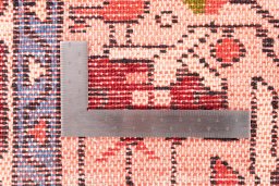 Corner detail of 1974s Malayer rug showing border pattern and Wool pile