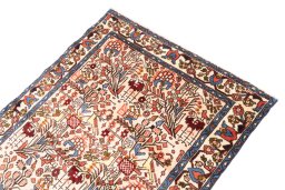 Surface texture of 1974s Malayer rug with natural Wool and intricate pattern
