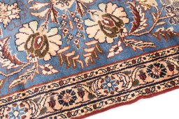Backside of handmade 1981s Malayer rug showing knot structure and weave density