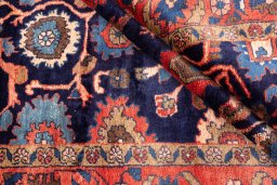 Corner detail of 1979s Malayer rug showing border pattern and Wool pile