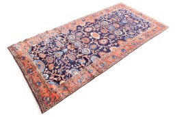 Corner detail of 1979s Malayer rug showing border pattern and Wool pile