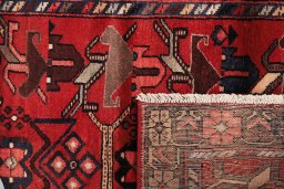 Close-up detail of 1980s Malayer rug from Iran / Persia showing Wool weave