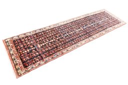 Corner detail of 1974s Malayer rug showing border pattern and Wool pile