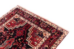 Corner detail of 1970s Malayer rug showing border pattern and Wool pile