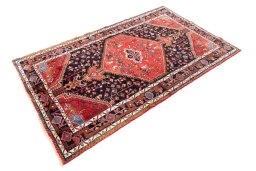 Corner detail of 1975s Malayer rug showing border pattern and Wool pile