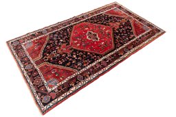 Close-up detail of 1975s Malayer rug from Iran / Persia showing Wool weave