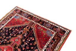Surface texture of 1975s Malayer rug with natural Wool and intricate pattern