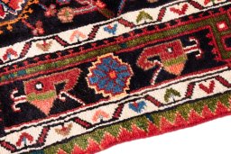 Backside of handmade 1975s Malayer rug showing knot structure and weave density