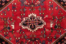 Full view of 1975s Malayer rug from Iran / Persia, 232 × 133 cm in Red tones