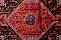 Corner detail of 1975s Malayer rug showing border pattern and Wool pile