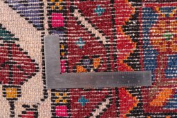 Surface texture of 1975s Malayer rug with natural Wool and intricate pattern