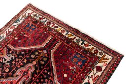 Surface texture of 1975s Malayer rug with natural Wool and intricate pattern