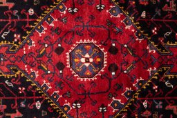 Corner detail of 1982s Malayer rug showing border pattern and Wool pile