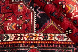 Close-up detail of 1982s Malayer rug from Iran / Persia showing Wool weave