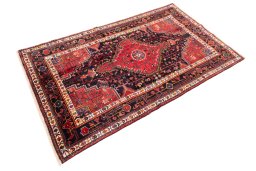 Corner detail of 1982s Malayer rug showing border pattern and Wool pile
