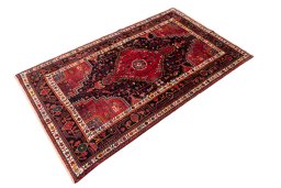 Close-up detail of 1982s Malayer rug from Iran / Persia showing Wool weave