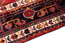 Backside of handmade 1982s Malayer rug showing knot structure and weave density