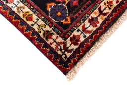 Central medallion detail of 1982s Malayer rug from Iran / Persia