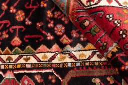 Corner detail of 1978s Malayer rug showing border pattern and Wool pile