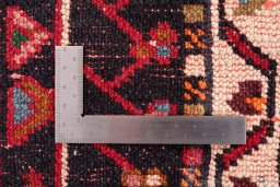 Close-up detail of 1978s Malayer rug from Iran / Persia showing Wool weave