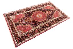Corner detail of 1978s Malayer rug showing border pattern and Wool pile