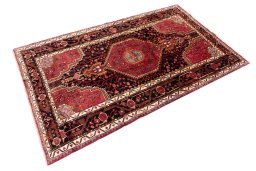 Close-up detail of 1978s Malayer rug from Iran / Persia showing Wool weave