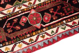 Backside of handmade 1978s Malayer rug showing knot structure and weave density