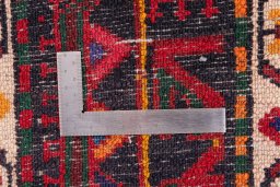 Corner detail of 1970s Malayer rug showing border pattern and Wool pile