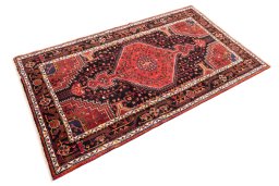 Corner detail of 1970s Malayer rug showing border pattern and Wool pile