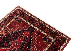 Surface texture of 1970s Malayer rug with natural Wool and intricate pattern