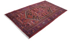 Close-up detail of New Malayer rug from Iran / Persia showing Wool weave