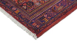 Backside of handmade New Malayer rug showing knot structure and weave density